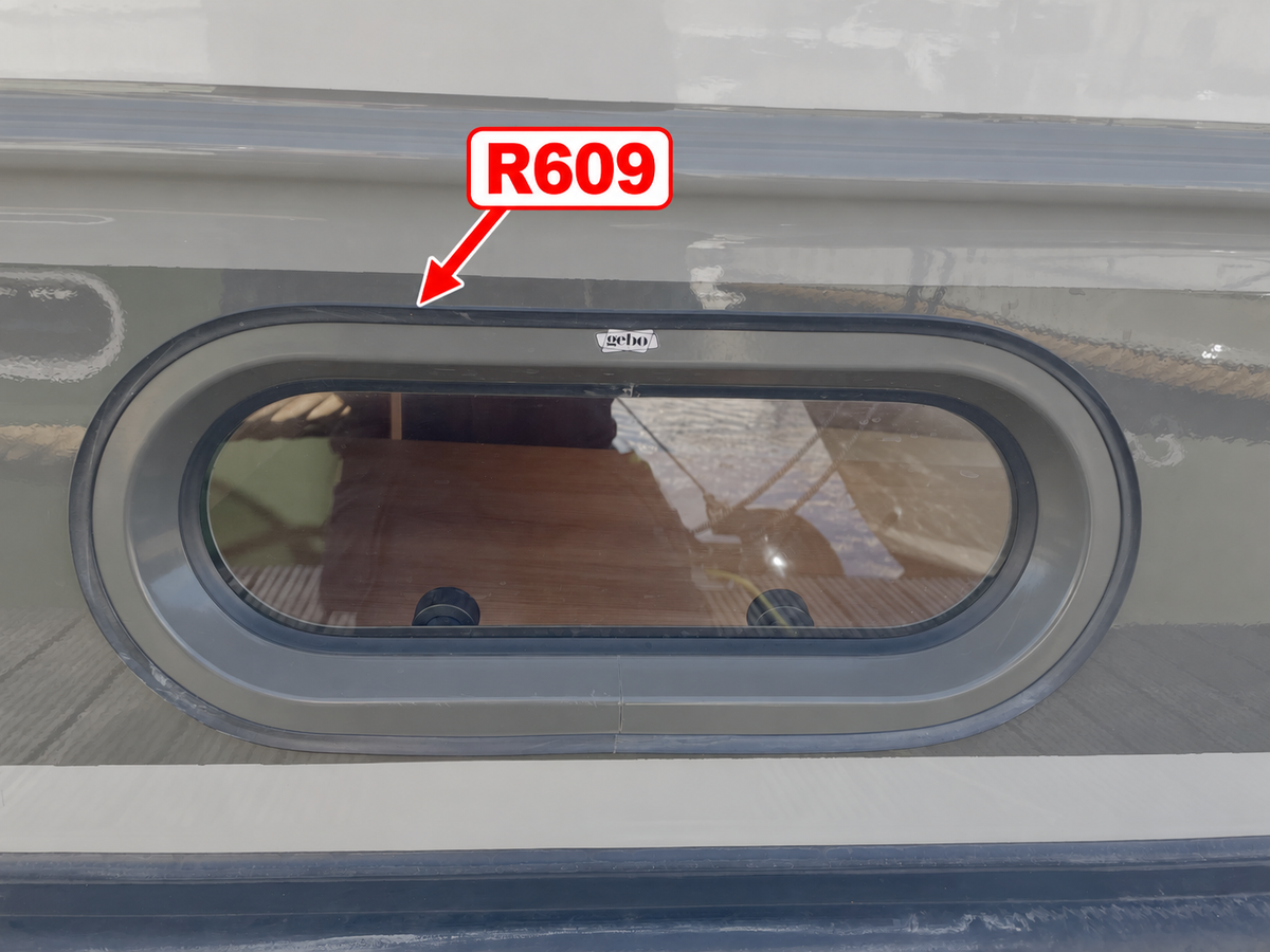 R609 outer rubber gutter on a Gebo Standard Series portlight, with an arrow identifying the gutter outside the metal frame.